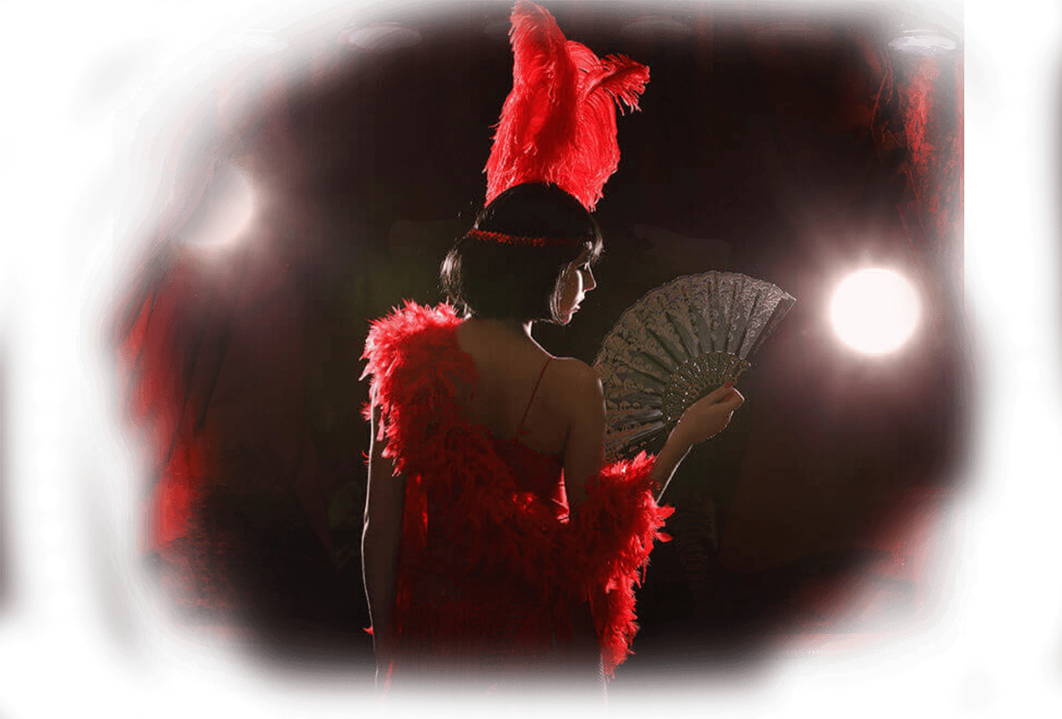 Hot burlesque show dancer on stage, long black curly hair and dressed up!
